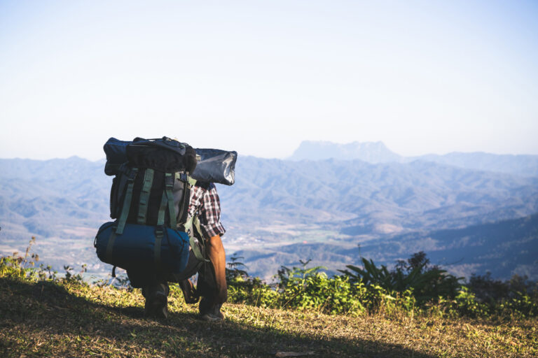 Open suitcase with neatly packed travel essentials